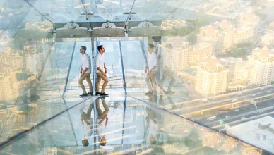 Man Posing at Sky Views Edge Walk