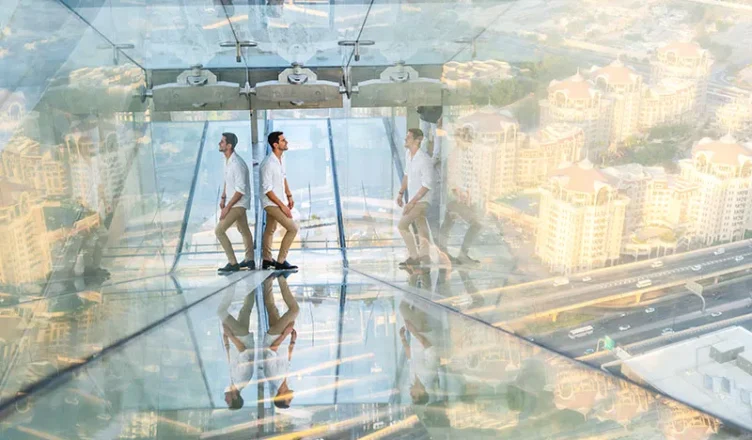 Man Posing at Sky Views Edge Walk
