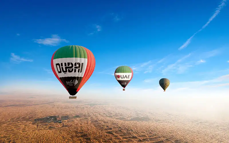 Hot air balloons flying over Dubai