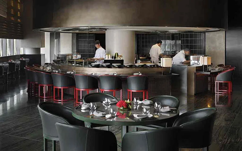 Chefs preparing dishes at Armani Hashi restaurant